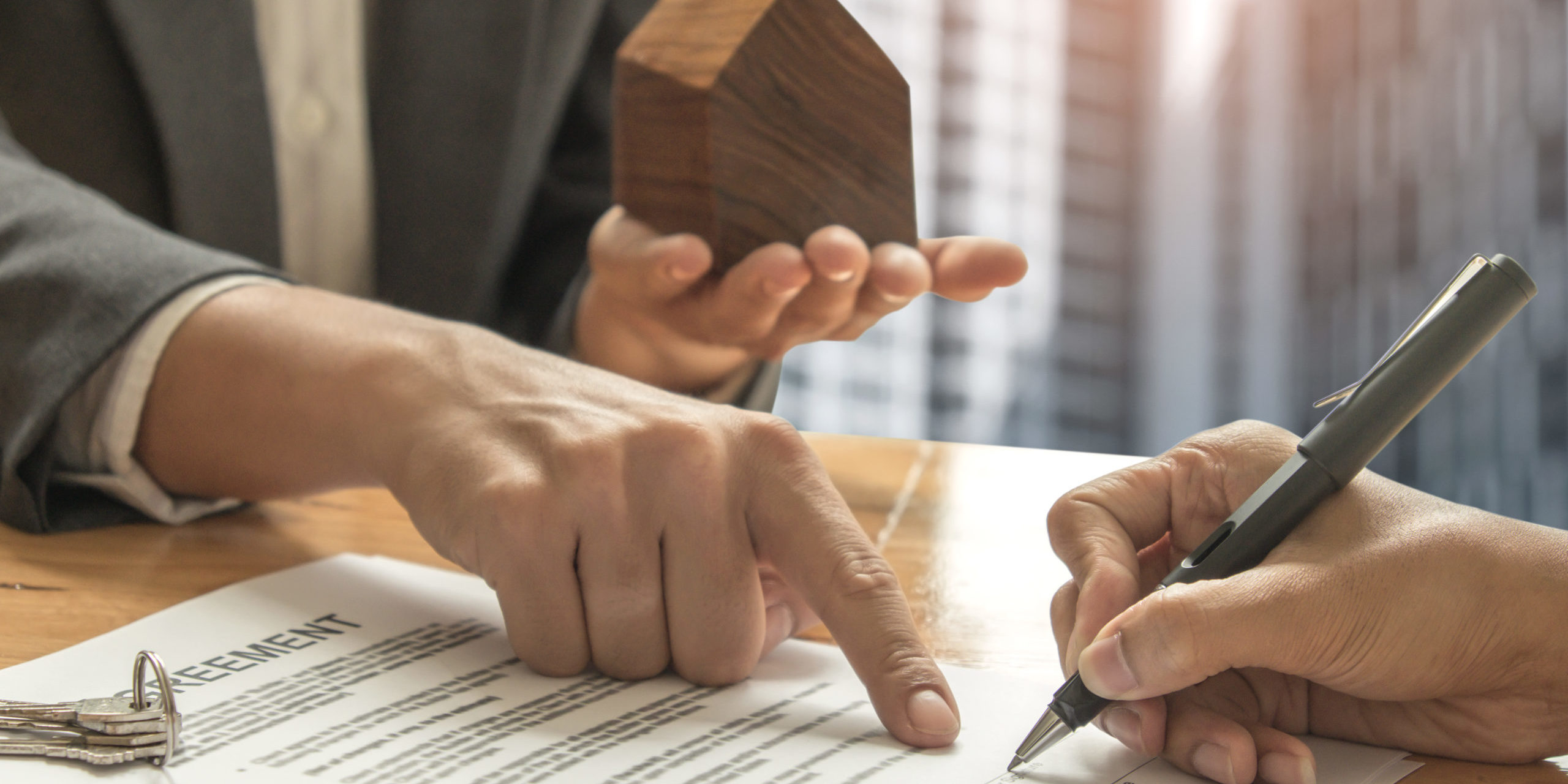 Real estate trading concepts,Home brokers and buyers signing a s